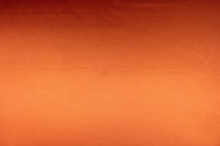 This multi-purpose mock linen in papaya (deep orange) has a soft luxurious feel with a subtle sheen.  It would be great for home decor, window treatments, pillows, duvet covers, tote bags and more.  We offer Shauna in other colors.