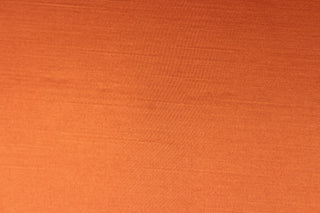 This multi-purpose mock linen in papaya (deep orange) has a soft luxurious feel with a subtle sheen.  It would be great for home decor, window treatments, pillows, duvet covers, tote bags and more.  We offer Shauna in other colors.