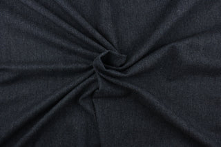 This wool features a herringbone design in blue and gray 