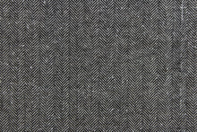 Load image into Gallery viewer, This wool features a herringbone design in black and white . 

