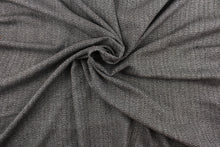 Load image into Gallery viewer,  This wool features a herringbone design in brown and white with hints of tan .
