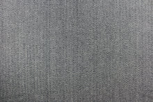 Load image into Gallery viewer,  This wool features a herringbone design in blue gray and lighter gray.

