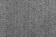 Load image into Gallery viewer,  This wool features a herringbone design in blue gray and lighter gray.
