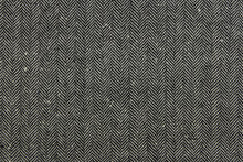 Load image into Gallery viewer, This wool features a herringbone design in black and cream white .
