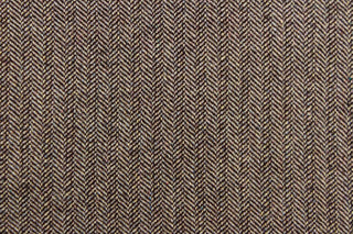 This wool features a herringbone design in brown and light beige with hints of varying colors .