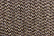 Load image into Gallery viewer, This wool features a herringbone design in brown and light beige with hints of varying colors .
