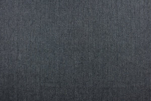 This wool features a herringbone design in a blue gray.