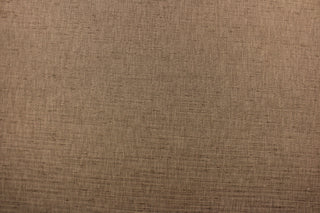  Voltaire is a woven, textured fabric in brown.  It has a slub yarn running across the the fabric which creates the look of silk with a soft, drapable hand.  The weight is suited for draperies, light upholstery, headboards, decorative pillows, coverlets and cornice boards.  We offer Voltaire in several different colors.