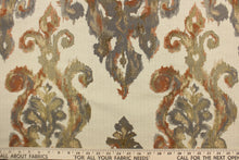 Load image into Gallery viewer,  This fabric features a watercolor demask design in orange, coral, gray, gold and beige against a pale beige. 
