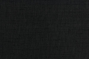 Voltaire is a woven, textured fabric in black.  It has a slub yarn running across the the fabric which creates the look of silk with a soft, drapable hand.  The weight is suited for draperies, light upholstery, headboards, decorative pillows, coverlets and cornice boards.  We offer Voltaire in several different colors.