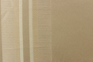 This rich woven yarn dyed fabric features bold multi width striped pattern in cream and light gold on a light khaki background.
