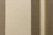 Load image into Gallery viewer,  This rich woven yarn dyed fabric features bold multi width striped pattern in dark gold and khaki on a light khaki or cream background. 
