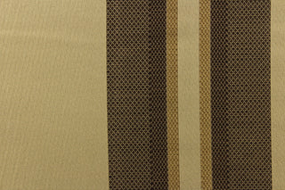 This rich woven yarn dyed fabric features bold multi width striped pattern in shades of brown and gold on a dark beige background.