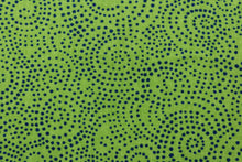 Load image into Gallery viewer, This whimsical print offers bold color and simplicity, with a simple design of swirls of tiny bold blue dots on a cabana green  background.
