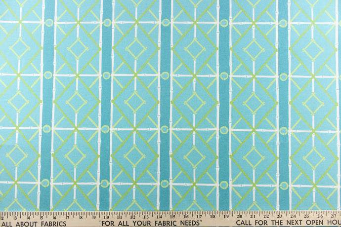   This very unique fabric with a tropical theme, feature a geometric pattern of bamboo looking diamonds, stripes and circles in a cabana blue color with lime green and turquoise blue colors along with some white strips.