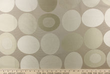 Load image into Gallery viewer,  Stylish, modern and contemporary best describe this geometric pattern of circles and ovals in gray tones or champagne on a khaki background.
