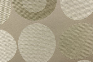  Stylish, modern and contemporary best describe this geometric pattern of circles and ovals in gray tones or champagne on a khaki background.