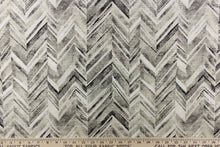 Load image into Gallery viewer, This fabric features a chevron design in shades of black, gray and white
