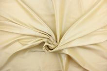 Load image into Gallery viewer, This taffeta fabric in a solid off white or cream. 
