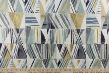 Load image into Gallery viewer,  This fabric features a beautiful geometric design in blue, mute gold, blue green, gray, light khaki and white. 
