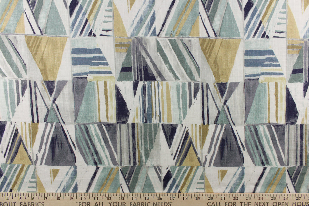  This fabric features a beautiful geometric design in blue, mute gold, blue green, gray, light khaki and white. 