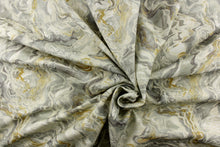 Load image into Gallery viewer,  This fabric features a marble look in gray tones, mute gold, white and off white. 
