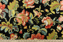 Load image into Gallery viewer, This fabric features a stunning floral design in yellow, pale blue, peach, burgundy, teal, green, red, beige, hints of white and outlined in gold against a black background.
