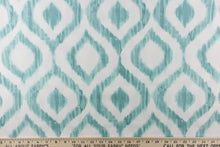Load image into Gallery viewer,  This geometric design features a diamond pattern in shades of ocean blue and white.
