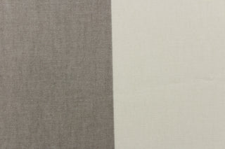 This fabric features a wide striped design in gray and white.