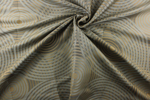 Geometric multi-layer, circular pattern in tone on tone colors in khaki, beige and blue tones