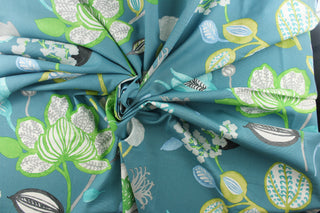 Stunning large floral design, with aqua blue, lime green, gray, white, black, and green colors on a teal blue background.