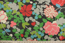 Load image into Gallery viewer, Blossom features a large scale floral design and is perfect for any project where the fabric will be exposed to the weather.  Able to resist stains and water and can withstand 500 hours of direct sunlight.  Strong and durable with a rating of 51,000 double rubs.  Uses include cushions, tablecloths, upholstery projects, decorative pillows and craft projects. This fabric has a slightly stiff feel but is easy to work with.  Colors included are red, pink, green, blue, gray, beige and black.
