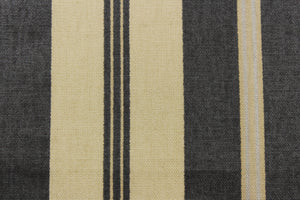 This formal Chintz fabric features a  dark gray and sliver stripe against a beige or natural background.