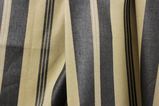 This formal Chintz fabric features a  dark gray and sliver stripe against a beige or natural background.