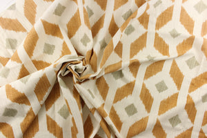  Offering a geometric large ikat diamond design on a cream or natural background with a gorgeous cognac brown with a smaller gray diamond in the center. 
