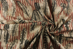 The cayenne color features a finely detailed feathers on a muted red stripe with black feathers on a tan background.