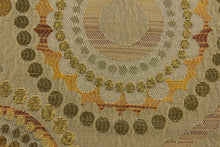 Load image into Gallery viewer, This contemporary geometric design features overlapping circles and dots in beige, brown, gold, green and copper colors.
