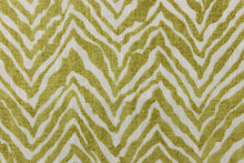 Load image into Gallery viewer, This fabric features a chevron tiger stripe in lime green  against a white background. 
