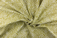 Load image into Gallery viewer, This fabric features a chevron tiger stripe in lime green  against a white background. 
