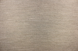 This multi-purpose mock linen features a striae pattern in sand dune  with black undertones.  This classic raw silk look is suitable for draperies, curtains, cornice boards and headboards.  We offer this fabric in other colors.