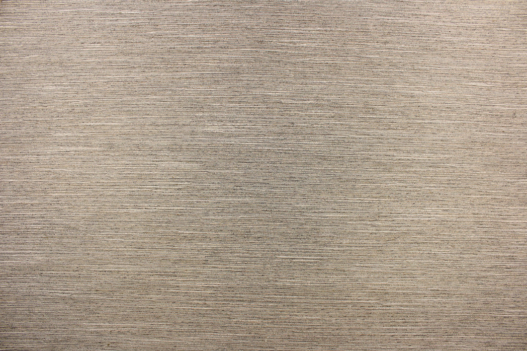 This multi-purpose mock linen features a striae pattern in sand dune  with black undertones.  This classic raw silk look is suitable for draperies, curtains, cornice boards and headboards.  We offer this fabric in other colors.