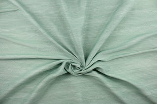 This multi-purpose mock linen in aqua would be great for home decor, window treatments, pillows, duvet covers, tote bags and more.  We offer this fabric in other colors.