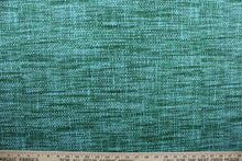 Load image into Gallery viewer,  Remi is the perfect outdoor fabric for your home.  It features an elegant navy blue, teal, kelly green, sky blue, and light blue colorway that is fade resistant and withstanding up to 500 hours of direct sunlight.  Additionally, it is both water and stain resistant, and has a durable 10,000 double rubs construction.  Perfect for porches, patios and pool side.  Uses include toss pillows, cushions, upholstery, tote bags and more.  
