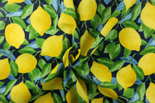 Load image into Gallery viewer, This beautiful outdoor design features lemons in yellow with green and blue leaves on a dark blue background. 

