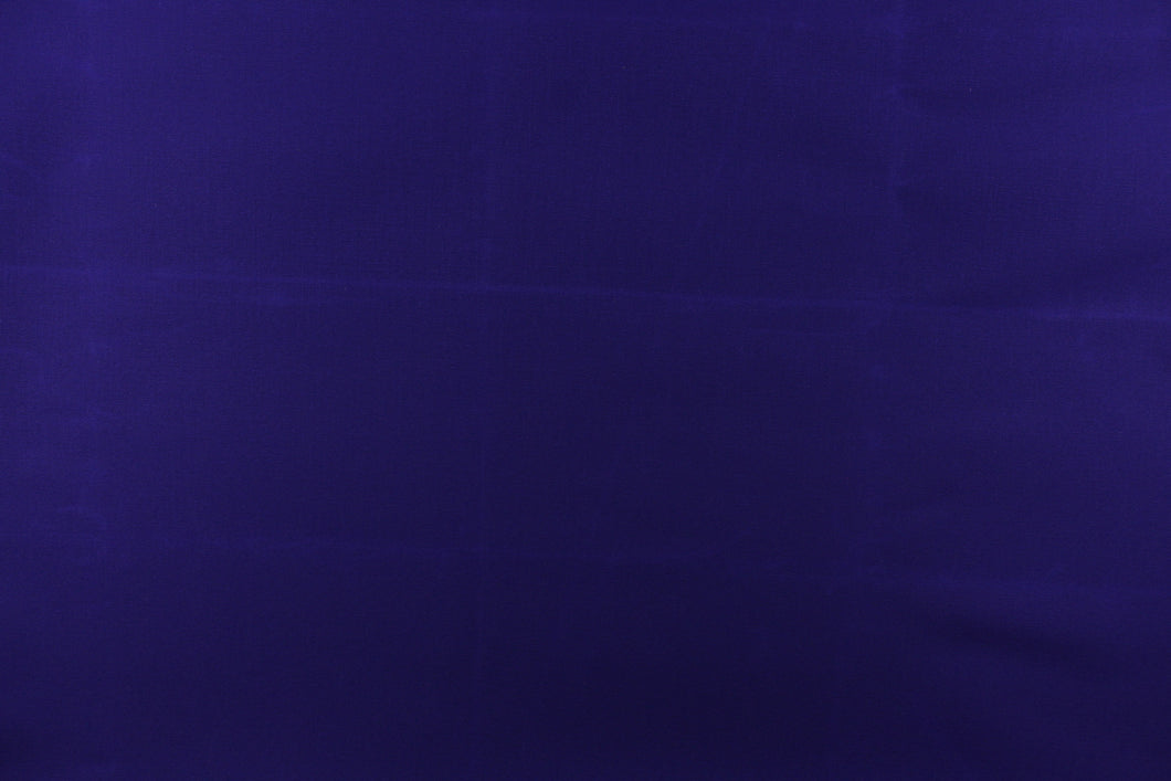 This fabric in a solid royal purple  color is great for umbrellas, outdoor upholstery and more.