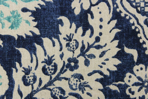 A beautiful medallion design in blue, turquoise, navy, and cream .