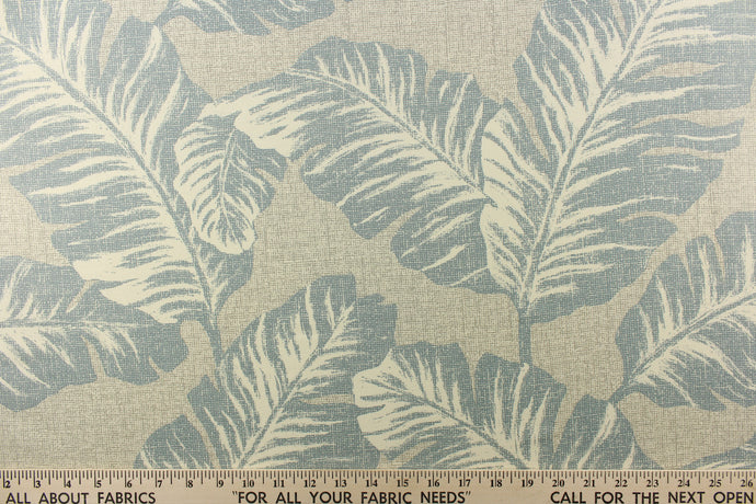  A beautiful large leaf design in blue gray, off white on a gray background.