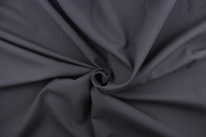 Twill fabric in a solid medium to dark gray . 