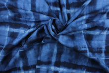 Load image into Gallery viewer, Arno is a plaid linen blend fabric in indigo.  The versatile fabric is perfect for window accents (draperies, valances, curtains and swags) cornice boards, accent pillows, bedding, headboards, cushions, ottomans, slipcovers and upholstery.  It has a soft workable feel yet is stable and durable with 24,000 double rubs.
