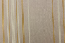 Load image into Gallery viewer,  This rich woven yarn dyed fabric features narrow width cream and khaki stripes on taupe background. 

